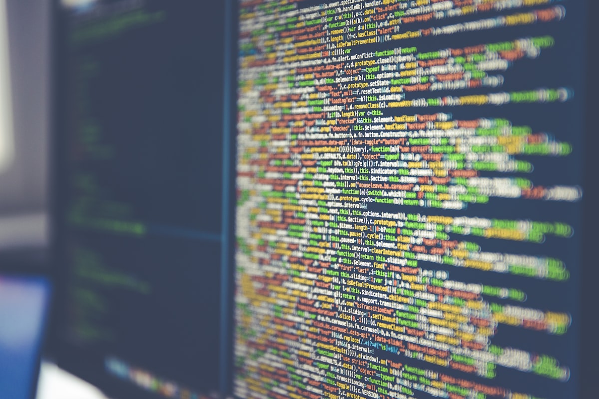 A screen filled with code — the everyday setup for comparing AI image tools