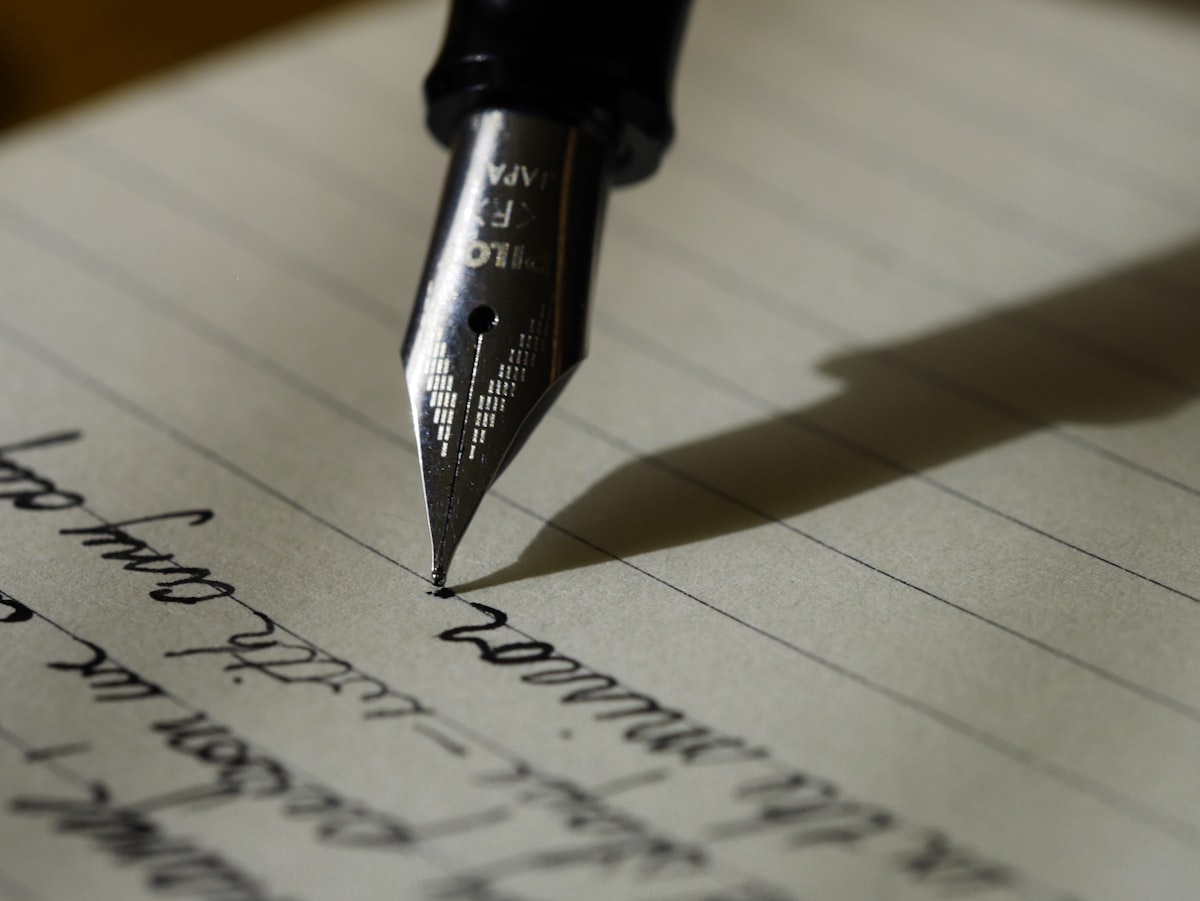 A typewriter surrounded by notes, a reminder that human editing still matters